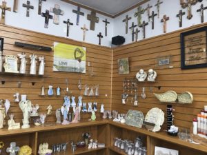 Various Crucifixes and Statues available at the Gift Center